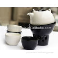 black and white porcelain tea set with warmer
